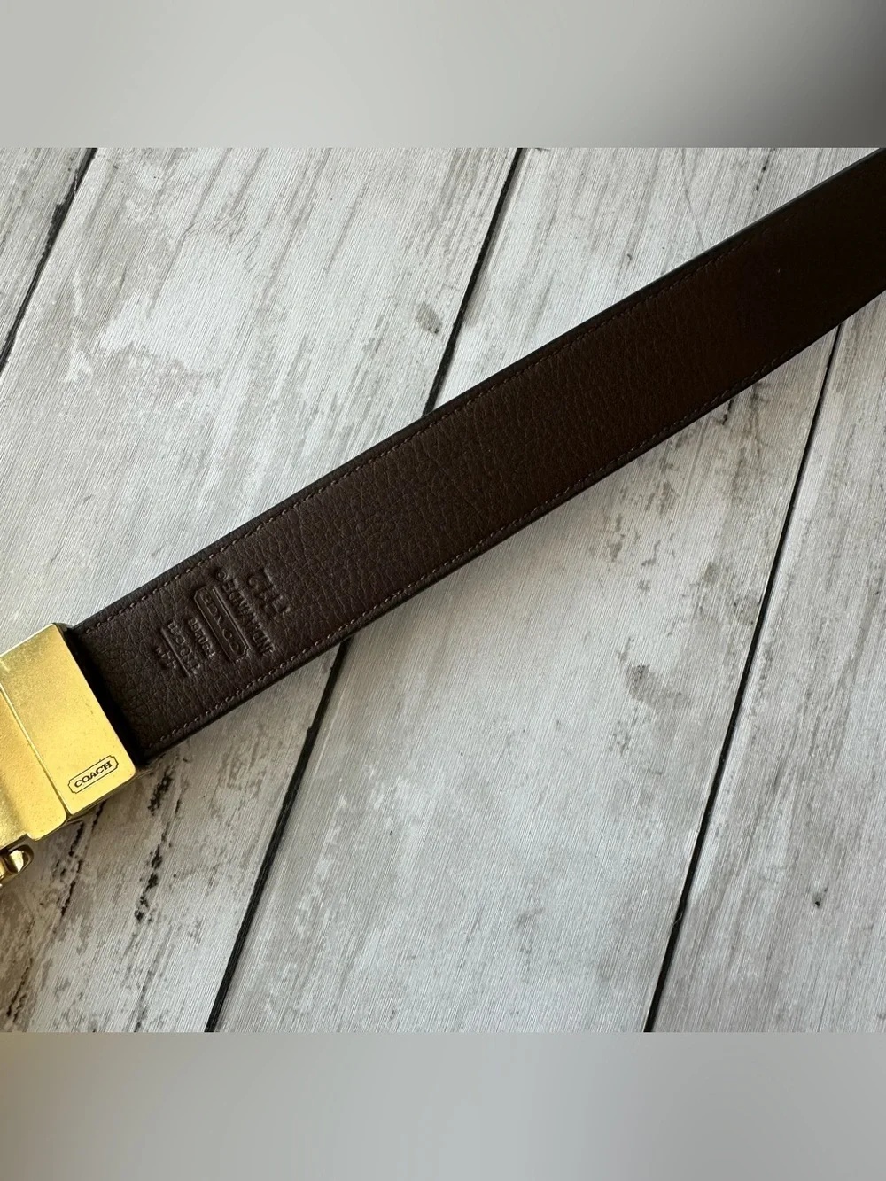 PREOWNED COACH MENS BLACK BROWN BELT WOTH GOLD TONE HARDWARE 44” Size